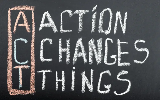 A chalkboard reading ACT: Action Changes Things
