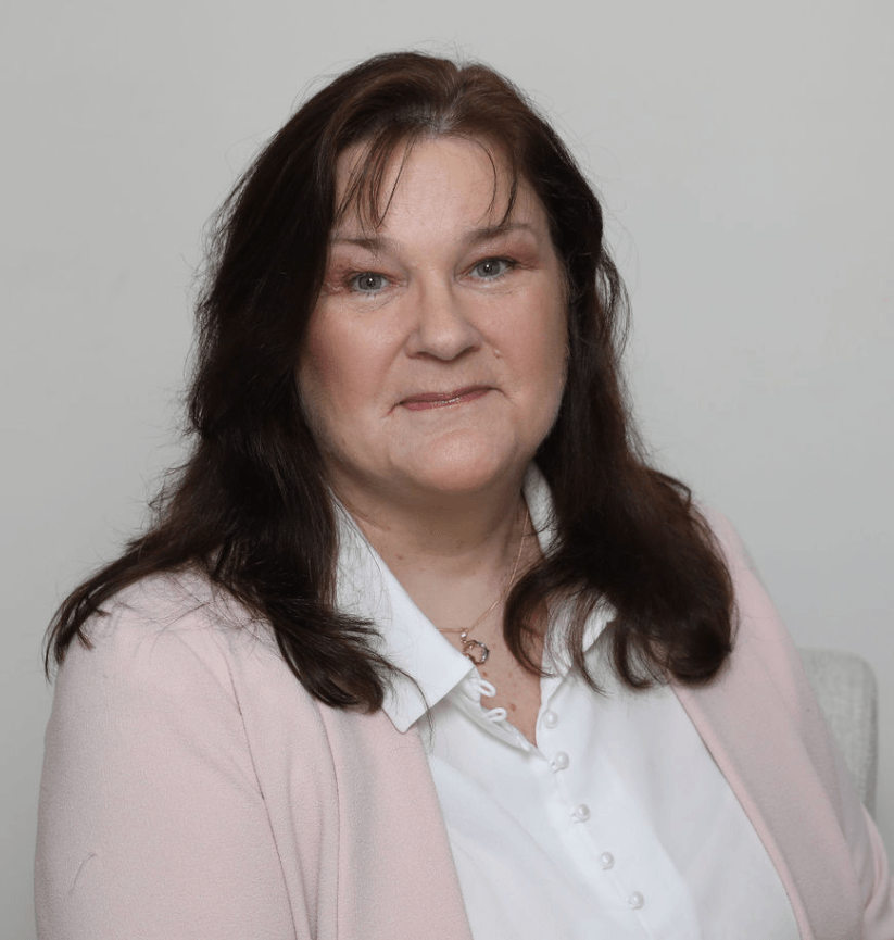 Carrie Wallis, marketing mentor, counsellor and bestselling author, smiling warmly